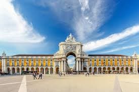 Praça do Comércio with yellow colonnades and Arco da Rua Augusta